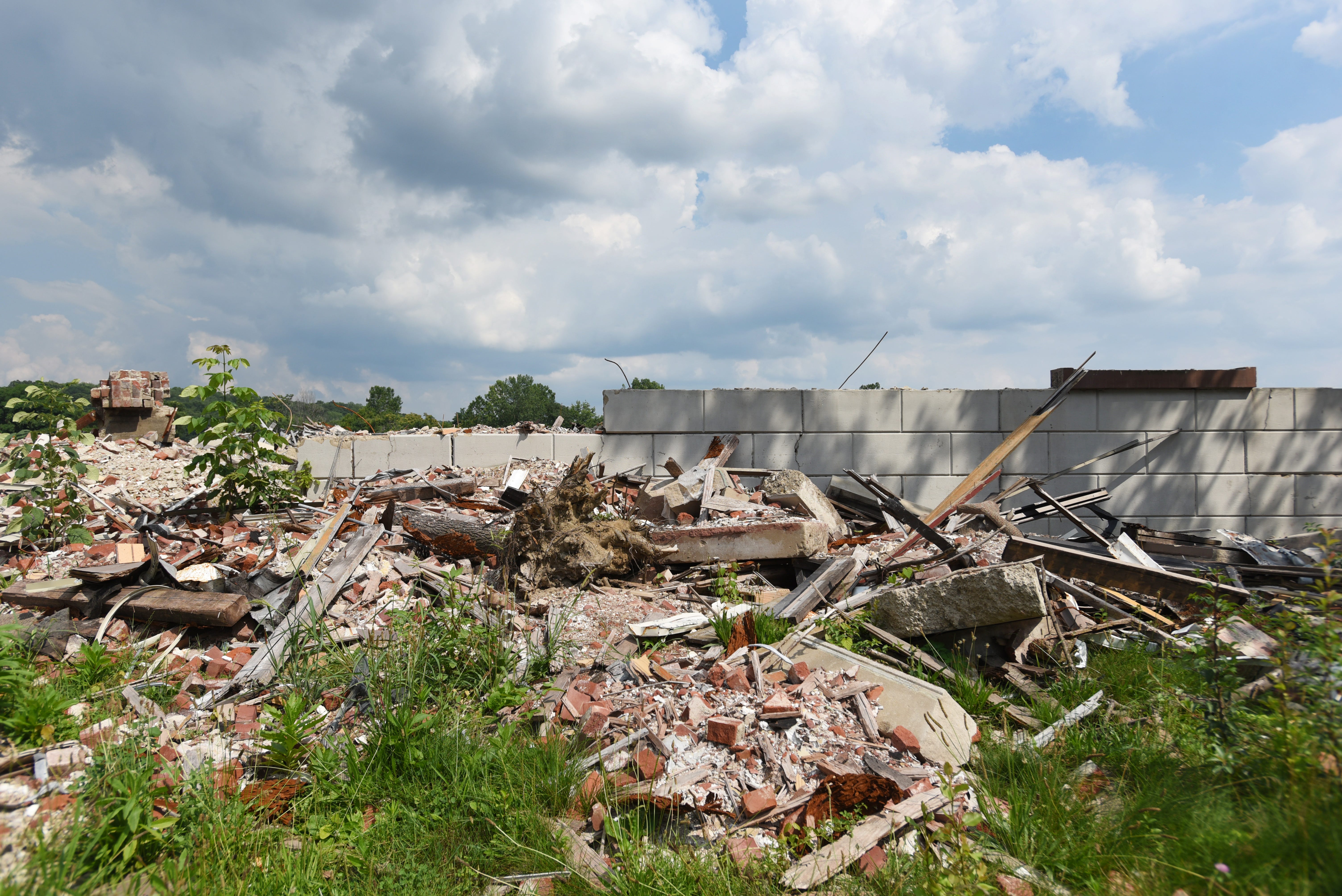 A sea of debris stretches along Linden Avenue in Zanesville, the ruins of a large building that once housed GE, United Technologies, Lear. Demolition was halted five years ago by the city and the rubble remains. Ohio Attorney General Dave Yost filed suit against Pelican Landholdings and a host of other companies in hopes of cleaning up the ruins of this 100-year-old structure, and the former Mosaic Tile building on Pershing Road.