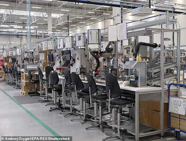 Manufacturing giant Johnson Matthey (pictured is the inside of its factory in Poland) has confirmed that it will cut 2,500 jobs due to the coronavirus crisis