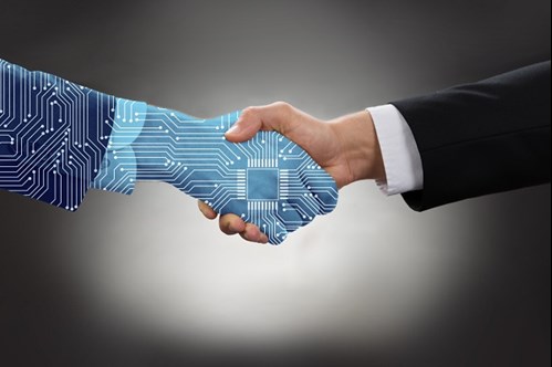 Human hand shaking digital hand