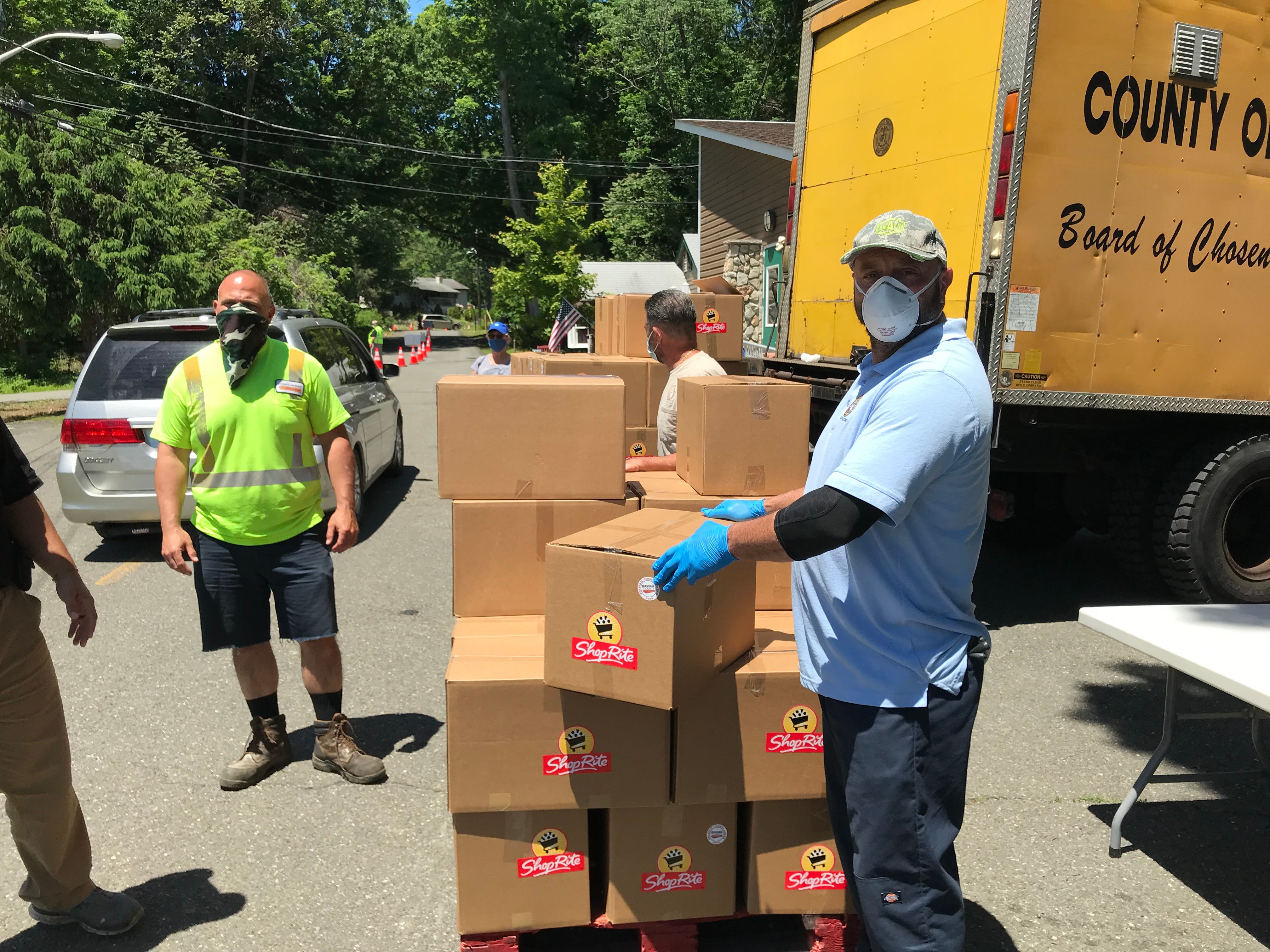 Passaic County was hoping to distribute 500 cartons of food at Camp Hope in West Milford on Monday.