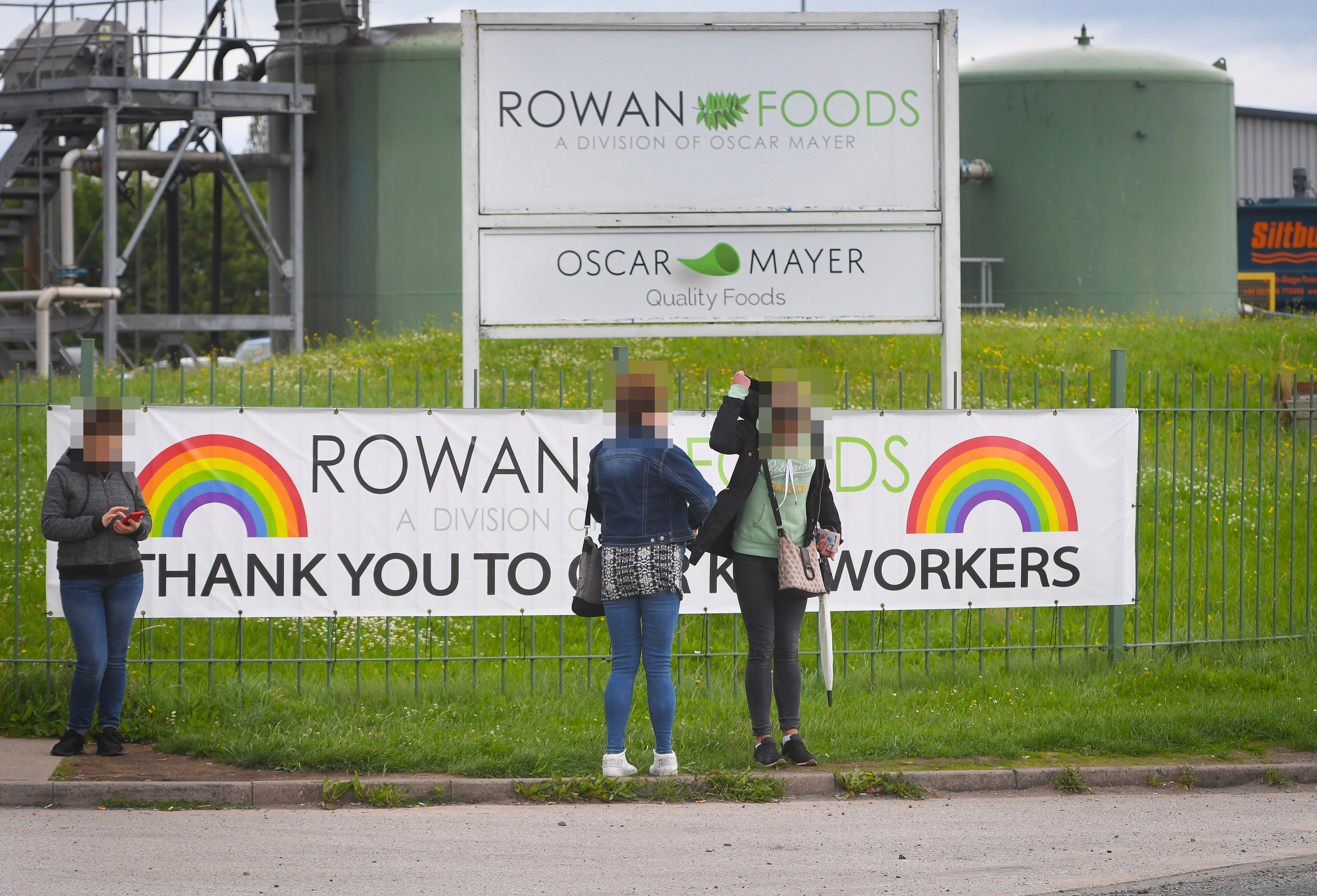 Workers were seen gathering outside the factory