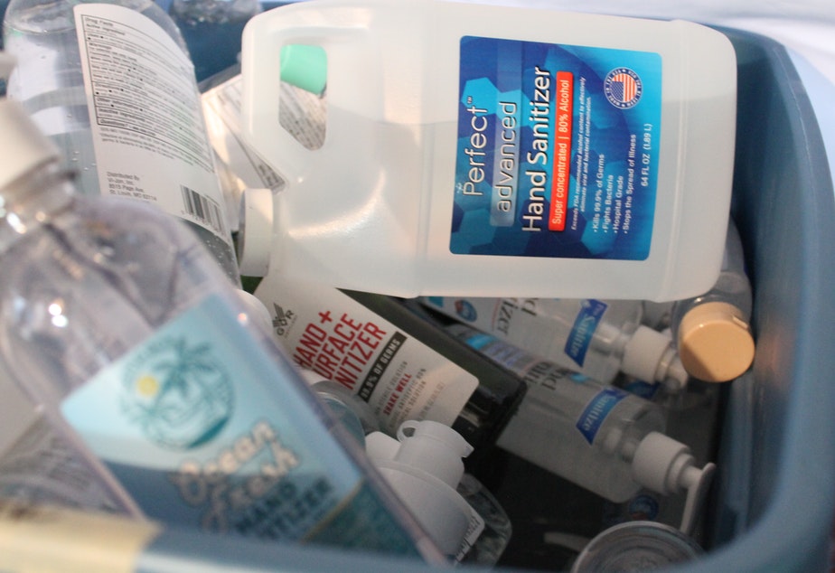 caption: Storage containers filled with donated hand sanitizer bottles are then distributed to protesters. Since the death of George Floyd at the hands of law enforcement, protests have been going on and off for about a month in Seattle. July 1, 2020. 