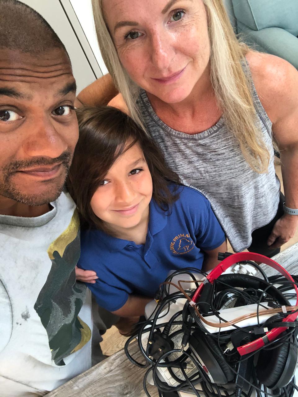 Sam Kumar with his wife and son.