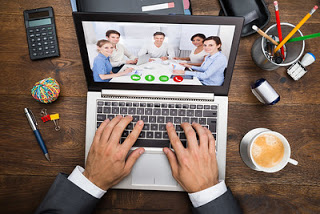 Enterprise Conferencing Software Strategic Sourcing Home Office Desk With Computer On Remote Conference Call