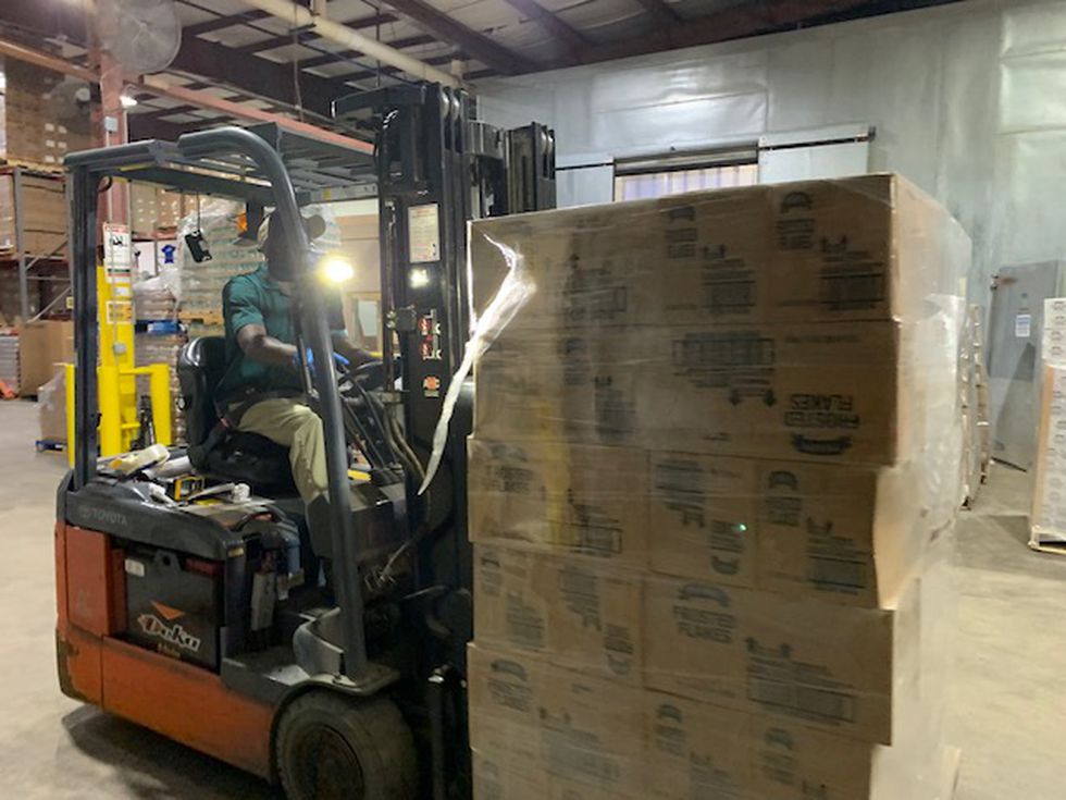 The first truckload of kid-friendly food purchased with PBJ PLUS! donations arrived Wednesday.