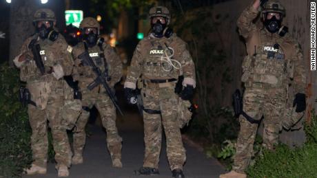 Federal officers were deployed to protect federal monuments and buildings in Portland. 