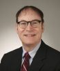 Headshot of Newsday employee James T. Madore on