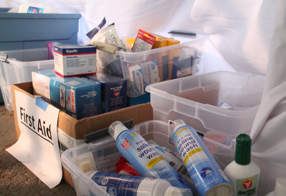 caption: Gauze, band-aids, and saline solution are part of the first aid supplies being housed in this underground supply center. July 1, 2020. 
