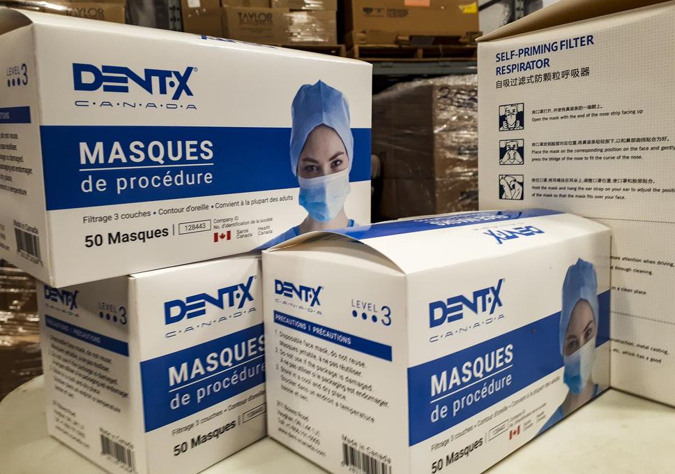 Personal protective equipment is stacked in one of Elections N.B.'s warehouses.