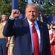 President Donald Trump pumps his fist as he arrives for the 2020 "Salute to America" event in honor of Independence Day on the South Lawn of the White House in Washington, DC, July 4, 2020.