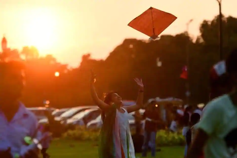 People flying kites near India Gate is a common sight.