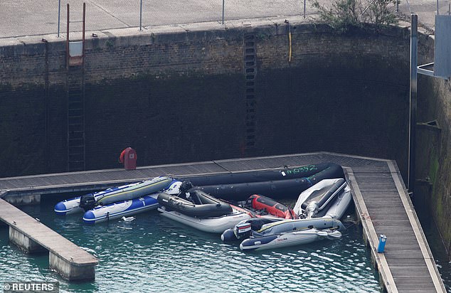 Ms Patel's Home Office has been accused of having 'lost control' after a new single-day record for migrant crossings was set on Thursday - when a 235 arrived in 17 vessels in one day. Pictured: A view showing dinghies being stored at Dover harbour