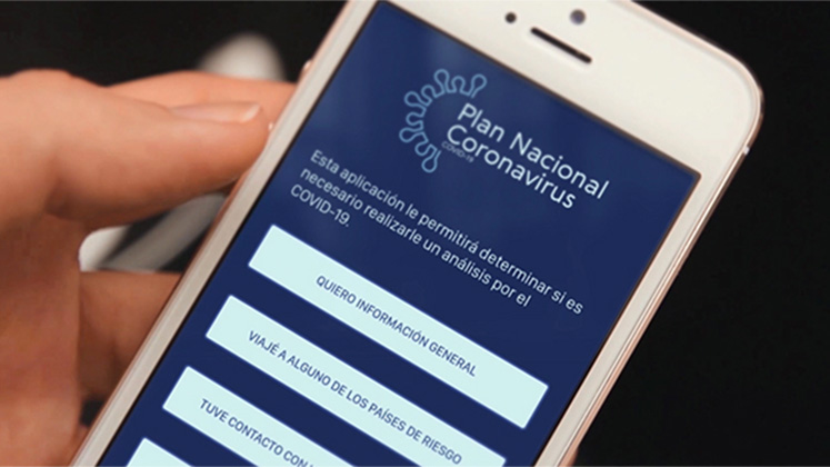 A user looks at Uruguay's COVID-19 app on a smartphone
