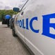 A Guam Police Department officer enters a police cruiser in preparations to depart the Hagåtña Precinct Command on Thursday, Jan. 24, 2019. 