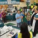 Fr. Patrick Garcia, right, sprinkles holy water to the bless the Pay-Less Supermarkets store in Yigo in this 2011 file photo.