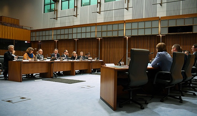 ASIC Chair James Shipton and ASIC members attend a public hearing in front of the Parliamentary Joint Committee on Corporations and Financial Services in September 2019.