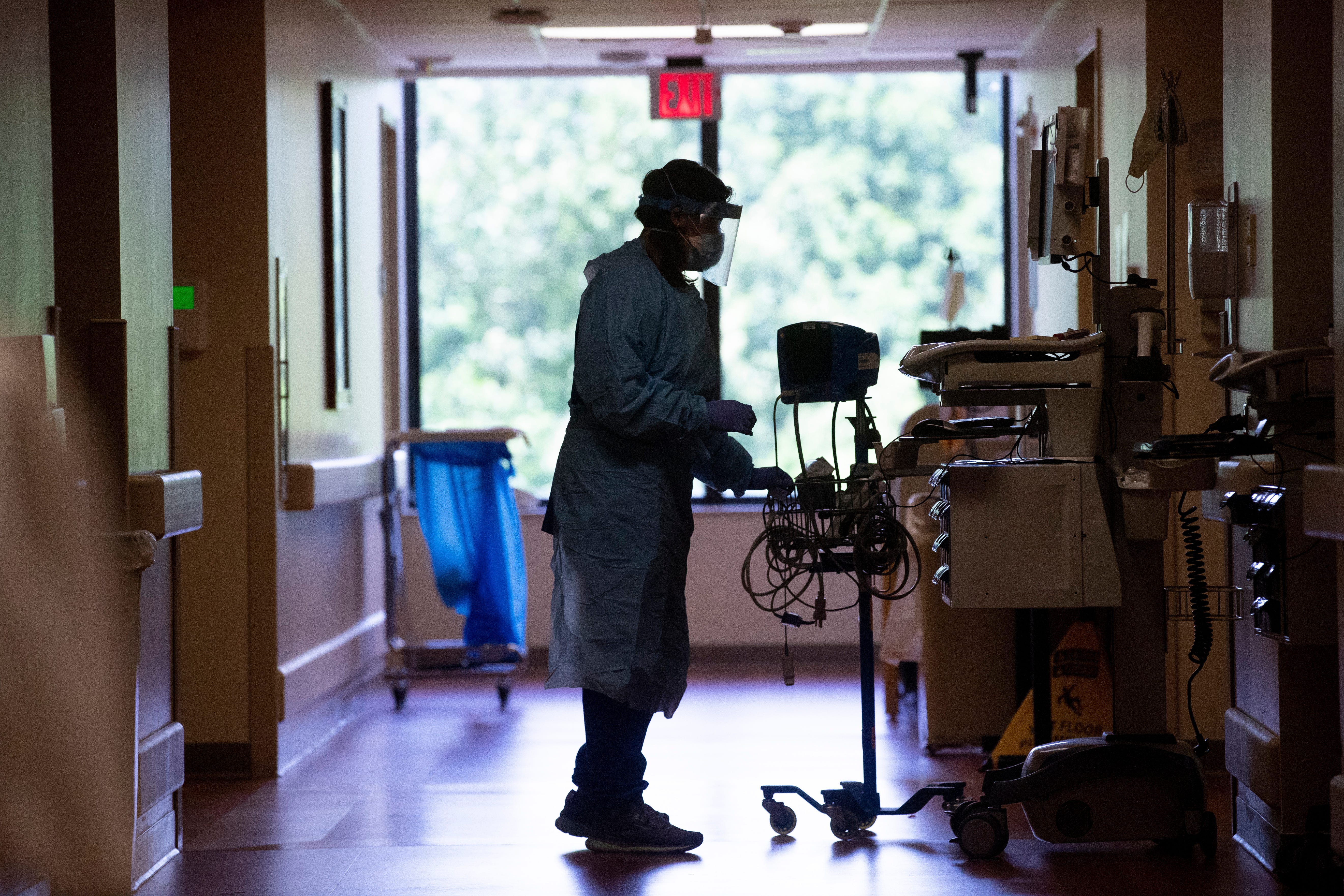 Doctors and nurses wear full-protective masks and face shields as they work with COVID-19 positive patients Baptist Memorial Hospital-Memphis on Thursday, May 14, 2020.