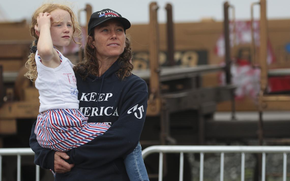 Jubilee Bond of Duluth dances with her six-year-old daughter Ever Bond during Vice President Mike Pence's campaign visit to Lake Superior Warehousing Friday in Duluth. (Clint Austin/caustin@duluthnews.com) Jubilee Bond of Duluth dances with her six-year-old daughter Ever Bond