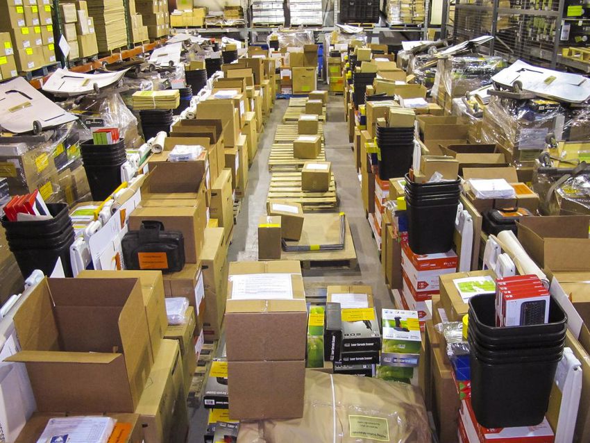 Piles of election supplies are stacked in one of Elections N.B.'s warehouses in Fredericton.
