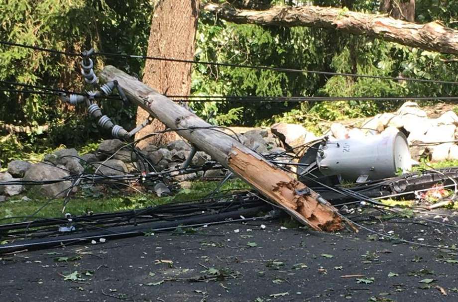 A utility pole lies in pieces along Nod Hill Road after it was snapped by high winds during Tropical Storm Isaias on Aug. 4. Photo: Contributed Photo / Wilton Bulletin Contributed