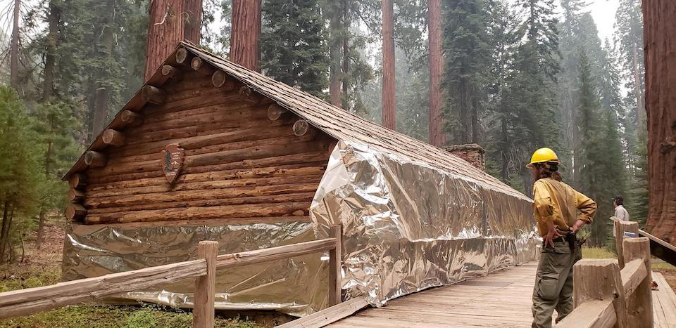 The Mariposa Grove Museum was wrapped in fire protective material as a precaution in case the Creek Fire move into the park/NPS The Mariposa Grove Museum was wrapped in fire protective material as a precaution in case the Creek Fire move into the park/NPS