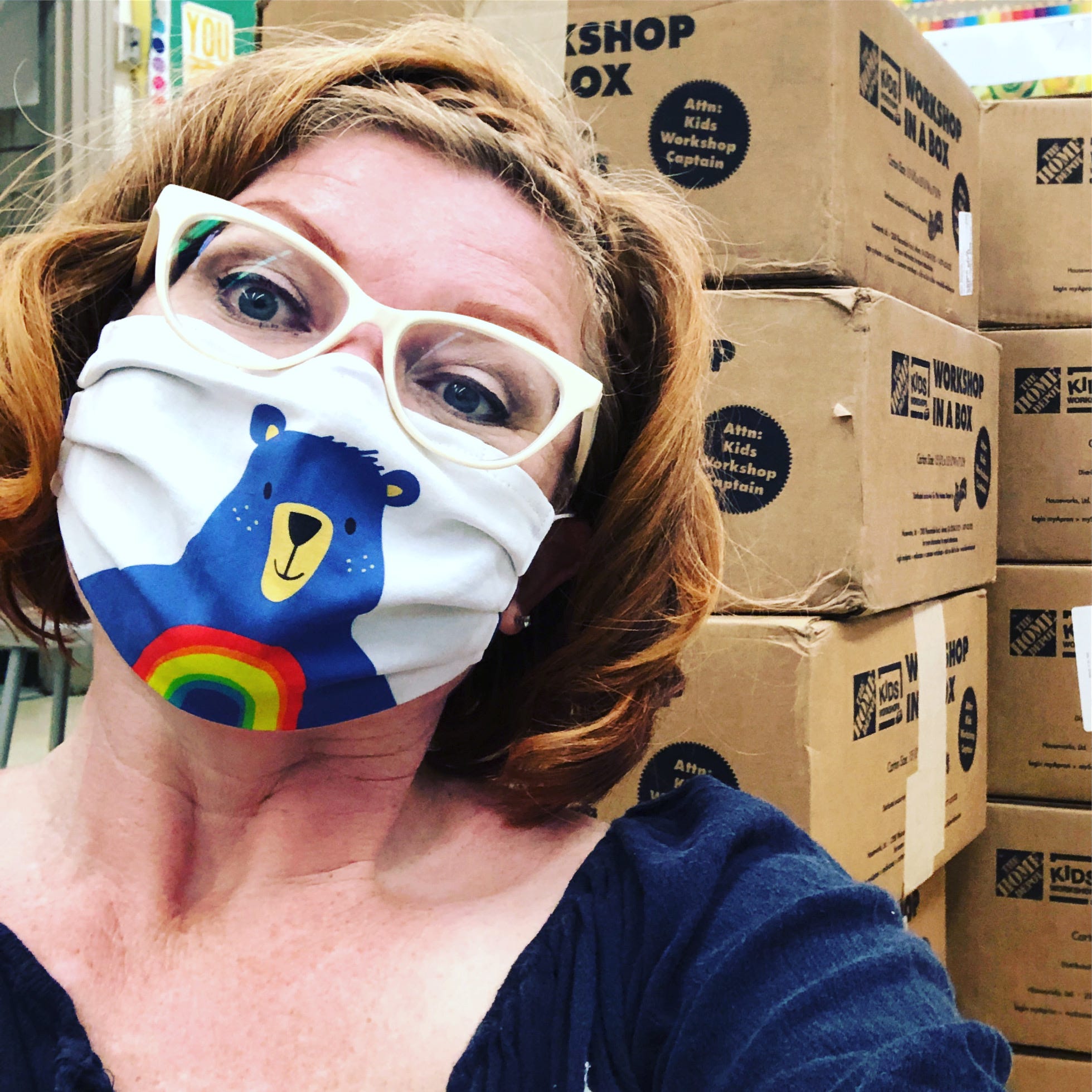 Beaumont Magnet Academy visual arts teacher Cheryl Burchett in one of the countless masks she’s made since spring. This design is specifically for the Beaumont faculty.