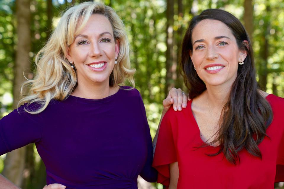 Hello Alice co-founders Elizabeth Gore in purple and Carolyn Rodz in red