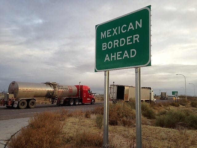 Semitrailers line up to enter Mexico at the Santa Teresa, N.M., port of entry.