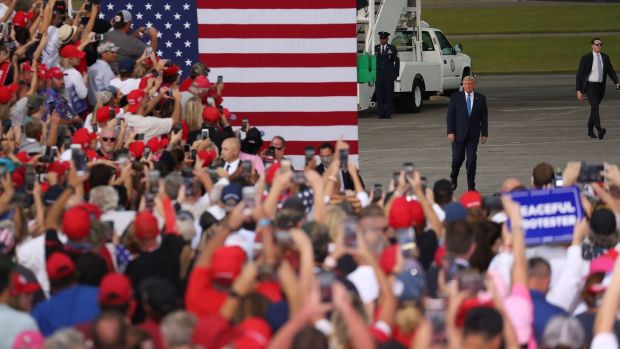 US president Donald Trump walks to the stage after arriving on Air Force One for his, ‘The Great American Comeback Rally’, at Cecil Airport on Thursday in Jacksonville, Florida. Photograph: Joe Raedle/Getty Images