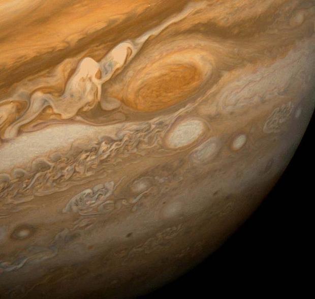 The Great Red Spot as seen from Voyager 1 This dramatic view of Jupiter s Great Red Spot and its sur...