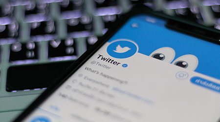 CHIANGMAI, THAILAND -JUL 10,2019:Smartphone open Twitter application,Twitter is an online social networking.