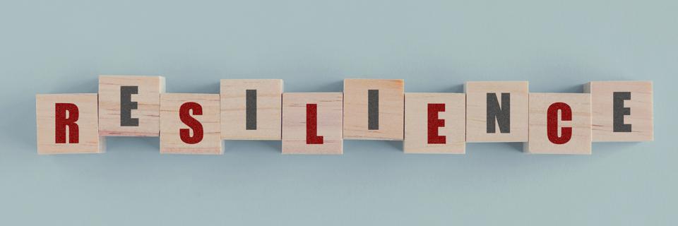Resilience is written on wooden blocks