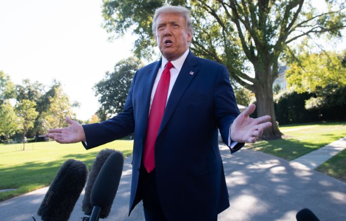 President Trump speaks to the media on the South Lawn of the White House in Washington, D.C., on Monday. (Saul Loeb/AFP via Getty Images)