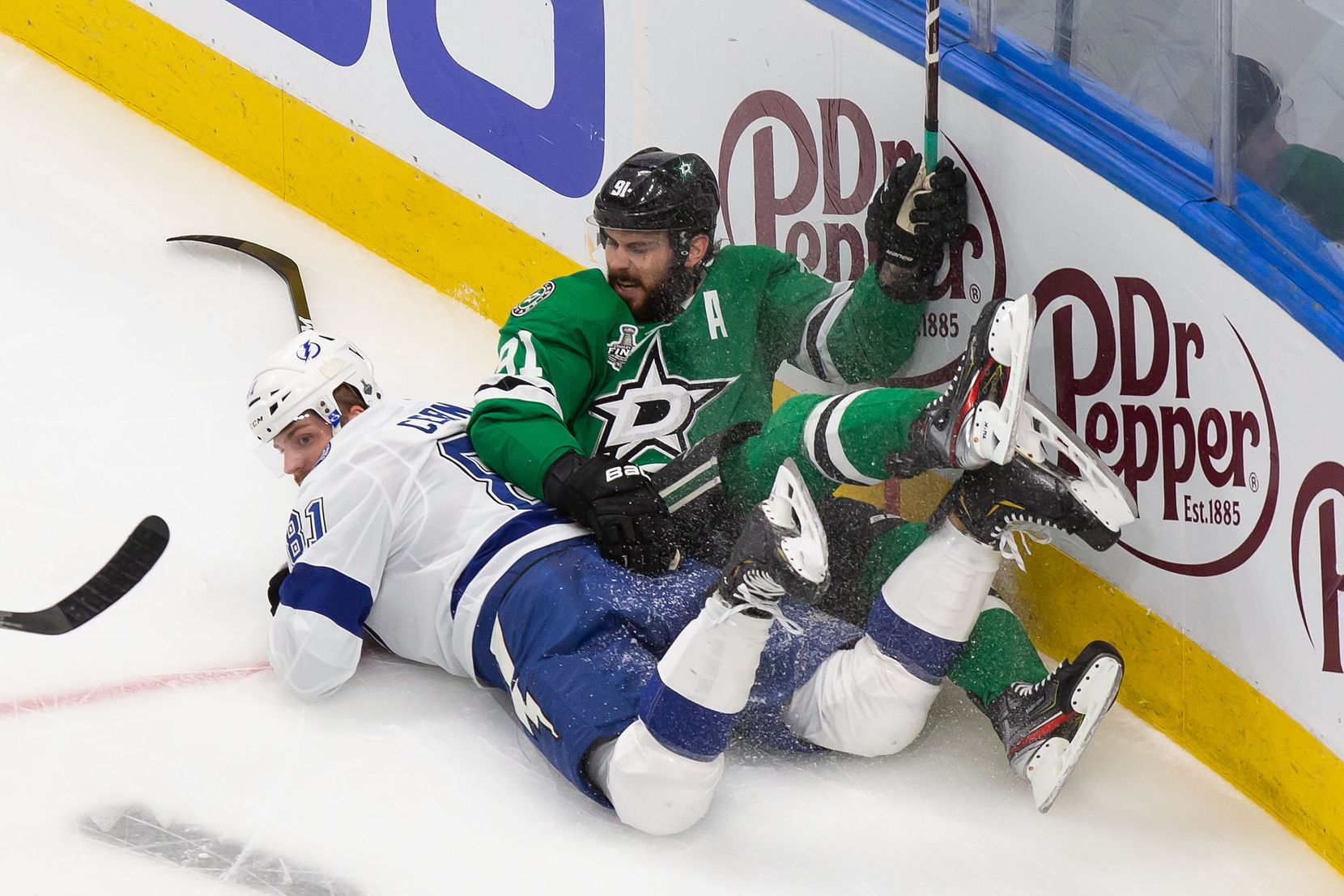 Tyler Seguin (91) of the Dallas Stars collides with Erik Cernak (81) of the Tampa Bay Lightning during Game Six of the Stanley Cup Final at Rogers Place in Edmonton, Alberta, Canada on Monday, September 28, 2020. (Codie McLachlan/Special Contributor)