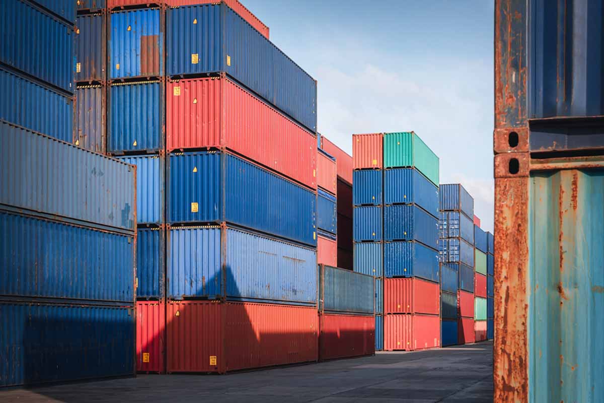Cargo stacked in a logistics hub.