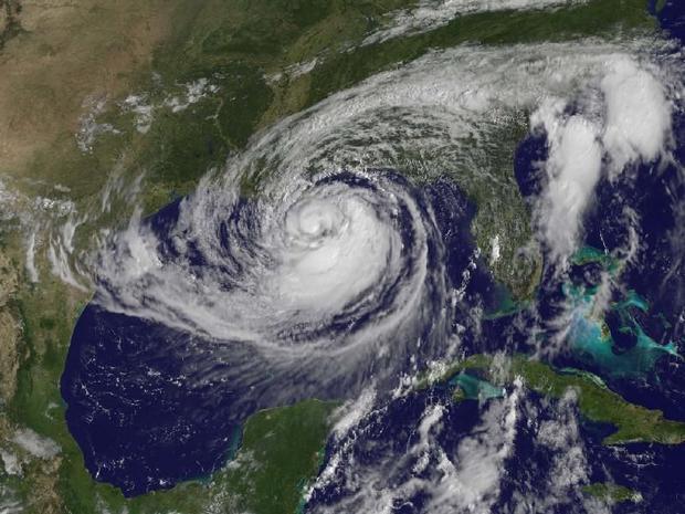 This visible image of Tropical Storm Isaac taken from NOAA s GOES-13 satellite shows the huge extent...