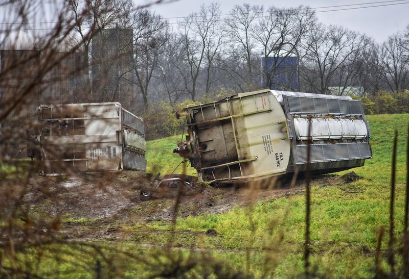 Derailed train cars still litter the site in Wayne Twp. where a train derailment early Tuesday morning shutdown U.S. 127. NICK GRAHAM/STAFF