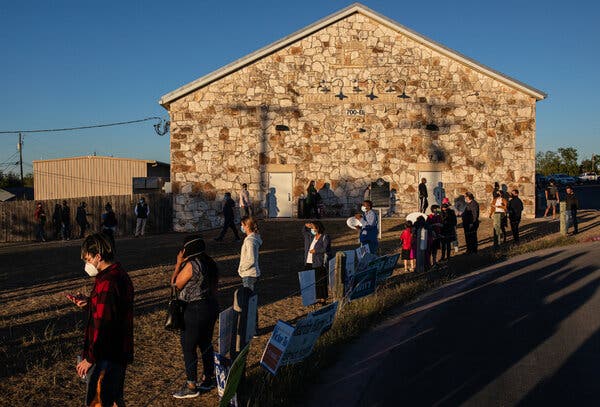 Voters waiting to cast their ballots in Pflugerville, Texas, on Friday.