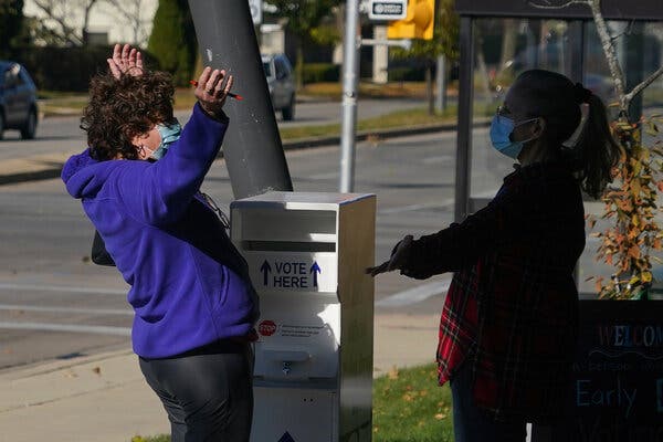 “I was just so excited to vote,” Mary Beth Mathes, left, said after dropping off her ballot in Milwaukee on Saturday.
