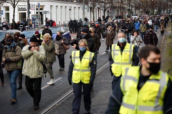 Protesters marched during a demonstration against German coronavirus restrictions in Berlin on Sunday.