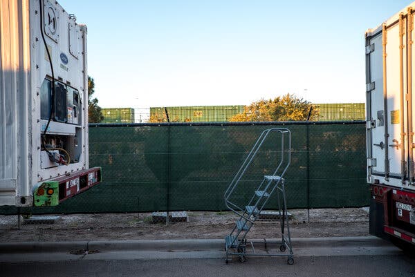 Mobile morgue trailers stationed outside the medical examiner’s office in El Paso, Texas, this month.