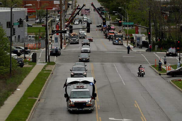 A funeral procession in April for a Kansas City firefighter who died of the coronavirus. More than 200 members of the city’s fire department have tested positive since the pandemic began.