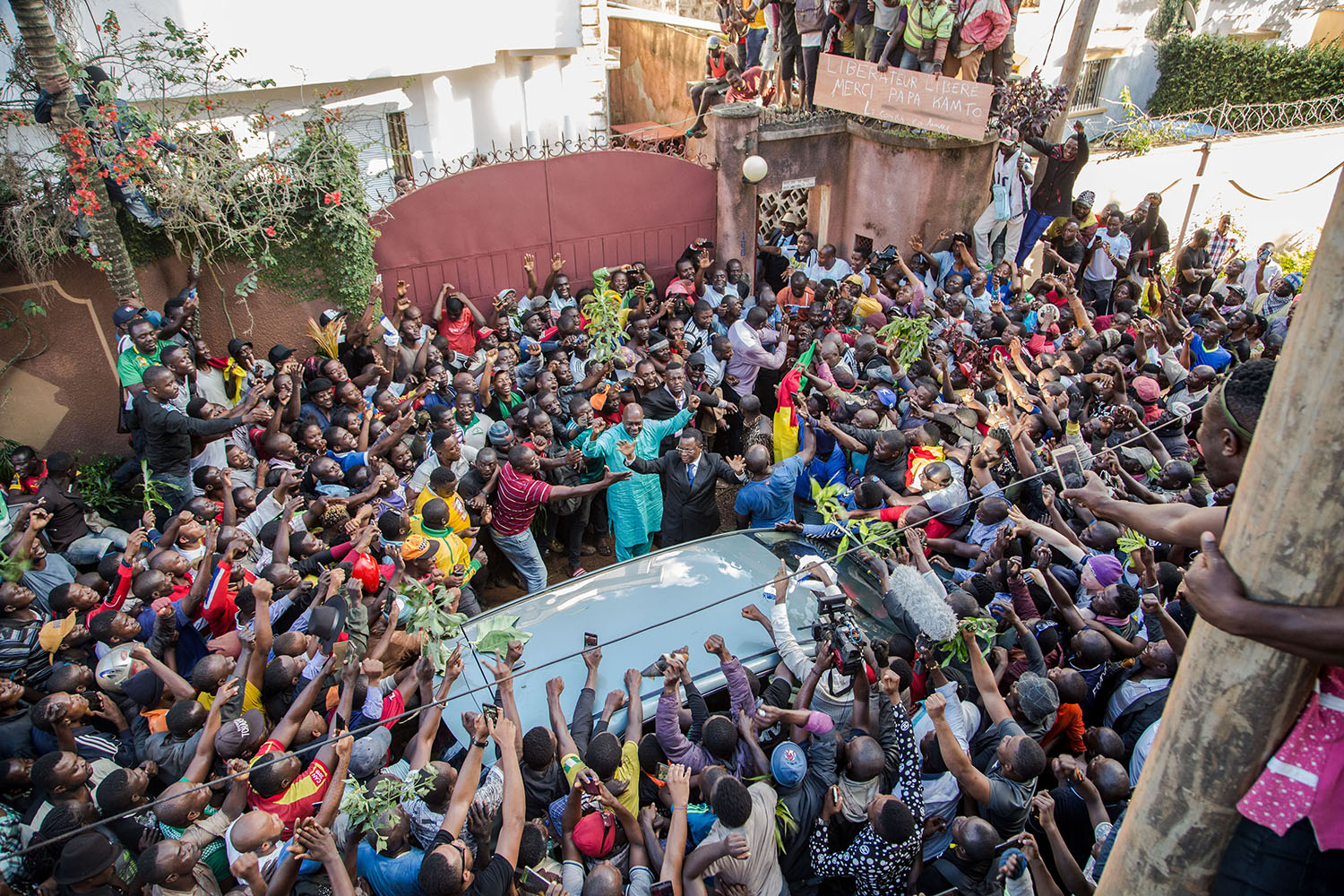 Cameroonian opposition leader Maurice Kamto is greeted by hundreds of supporters after his release from prison in Yaounde on Oct. 5, 2019.