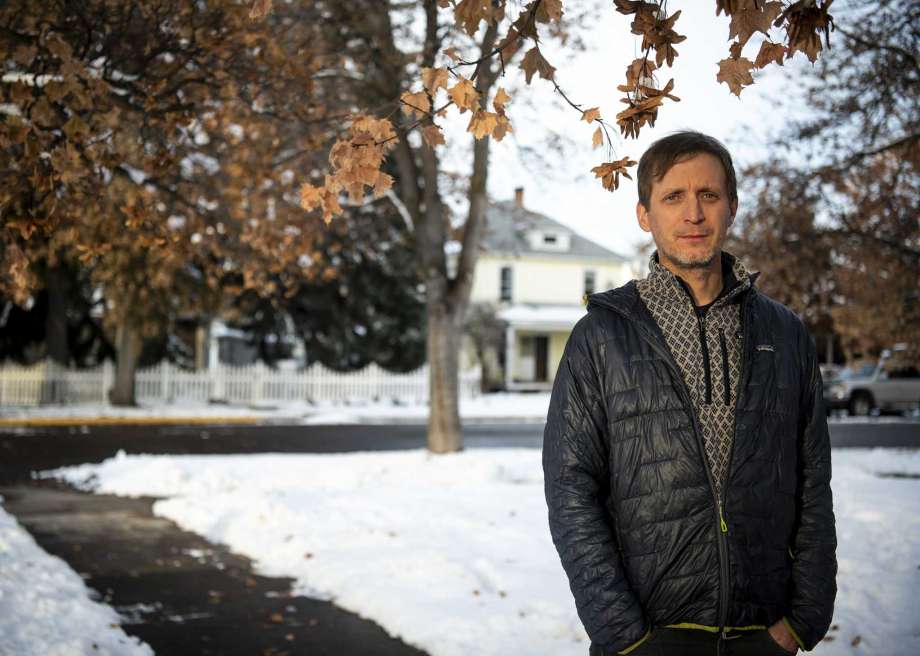 Mark Hebblewhite, a researcher at the University of Montana, is shown at his home on Thursday, Nov. 12, 2020 in Missoula, Mont. Hebblewhite and more than 150 fellow researchers from numerous nations compiled animal movement patterns over decades to chart the impacts of climate change on wildlife. (Ben Allan Smith/The Missoulian via AP) Photo: Ben Allan Smith, AP / Missoulian