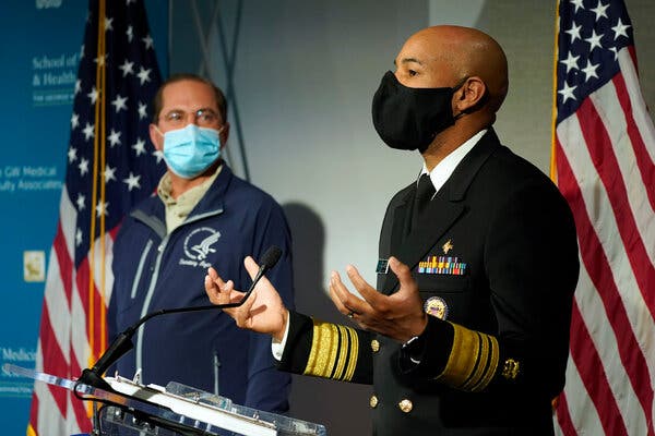 Alex M. Azar II, left, the health secretary, and Dr. Jerome Adams, the surgeon general, at George Washington University Hospital in Washington on Monday.