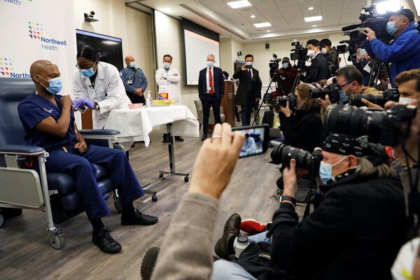 Dr. Yves Duroseau received the vaccine at Long Island Jewish Medical Center in New Hyde Park, N.Y., on Monday.