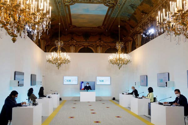 President Emmanuel Macron of France virtually attended a meeting at the Foreign Ministry in Paris on Thursday. His positive test for the coronavirus was announced on Thursday, after a week in which he met with numerous European leaders.