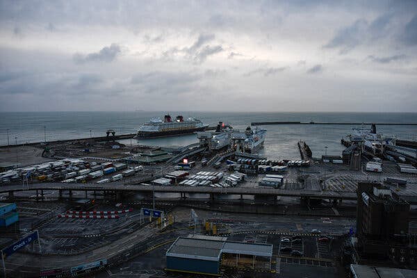 Trucks waited early Thursday to board ferries in Dover, England, to sail to France.