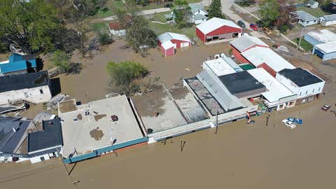 An aerial view of a flooded street after water from the Tittabawassee River breached the Edenville Dam on May 20, 2020, in Sanford, Michigan. (Photo by Gregory Shamus/Getty Images)