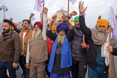 A group prepares to leave on the march from Amritsar to demand the repeal of new laws